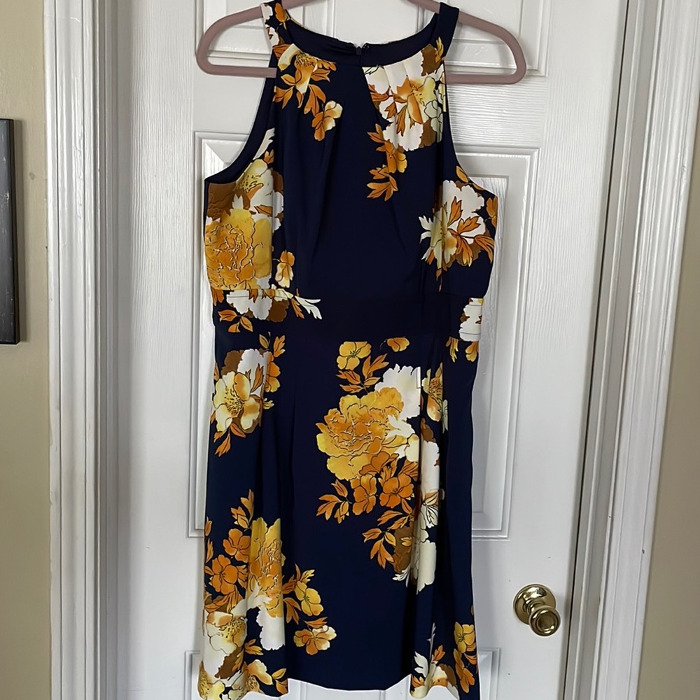 Navy blue floral, fit and flare, knee length dress.